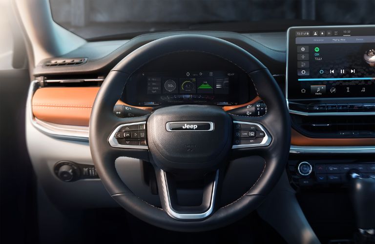 Steering wheel and dashboard View in the 2022 Jeep Compass
